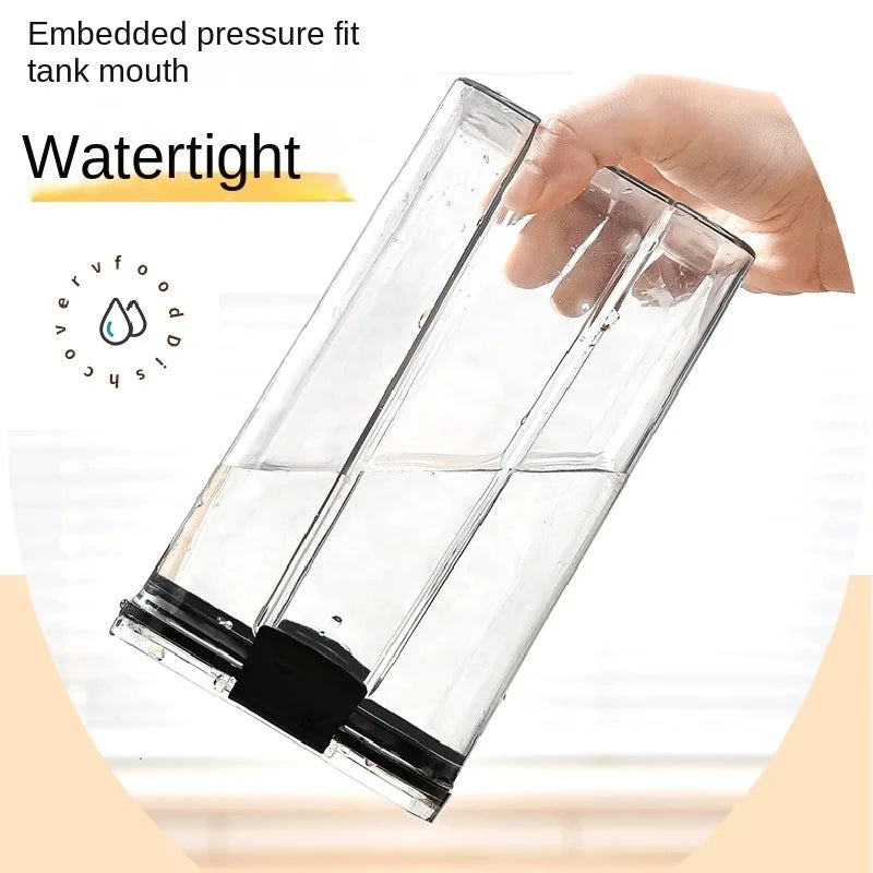 Clear container with black base held by a hand, labeled 'Watertight' and 'Embedded pressure fit tank mouth'.